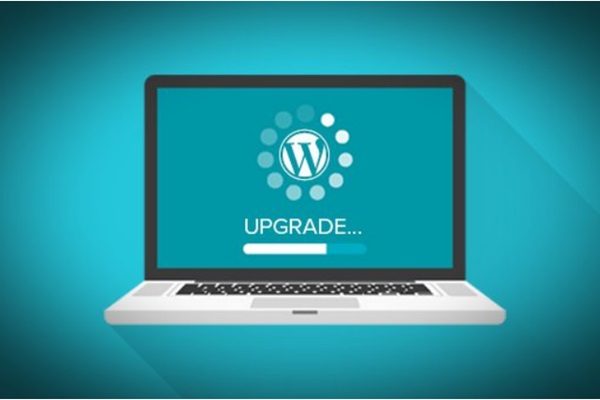 Laptop displaying a website updating to a newer version of WordPress.